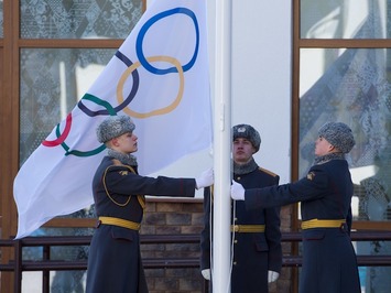 Raising the flag in the Olympic village