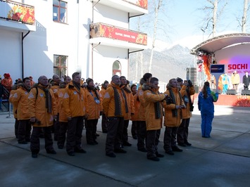 Raising the flag in the Olympic village