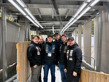 Ceļā uz Kortīnu – Latvijas kamaniņu sporta izlase sāk treniņnometni olimpiskajā trasē