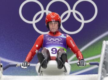 Sīva cīņa līdz pēdējai simtdaļai: sieviešu vieninieki olimpiskajā trasē Kortīnā