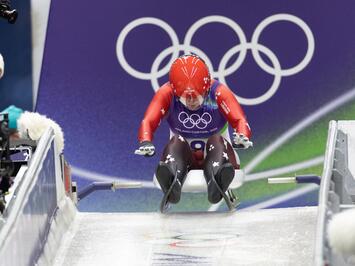 Sīva cīņa līdz pēdējai simtdaļai: sieviešu vieninieki olimpiskajā trasē Kortīnā